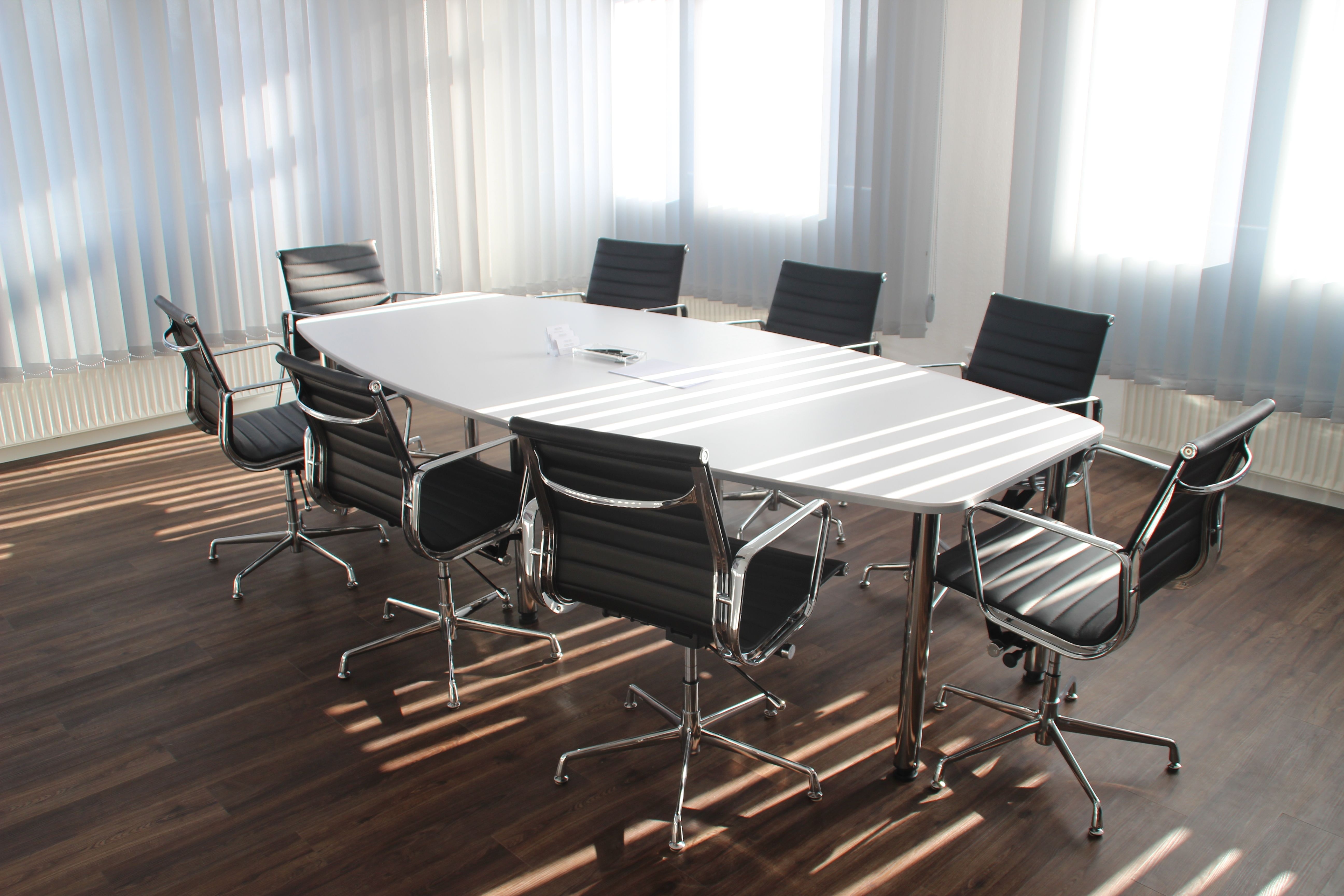 Image of business conference table and chairs